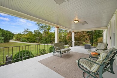 his inviting home features a large front porch, pe
