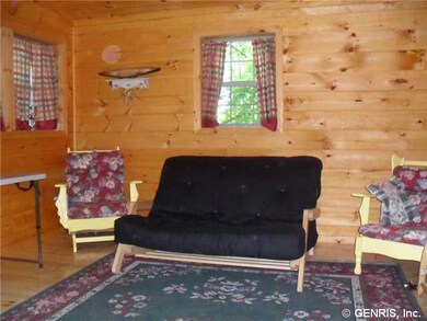 Living Room. Futon and matching chairs included .