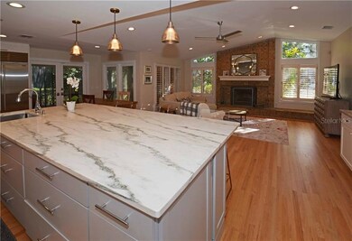 Exquisite Marble Island anchors this Great Room