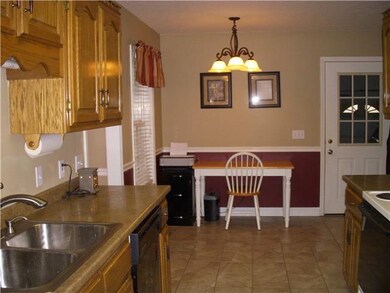 Kitchen has a nice nook area with ceramic tile