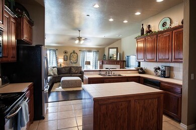 Stainless appliances and oak cabinets.