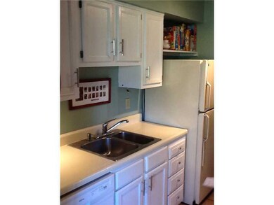 Kitchen. Light and bright make this kitchen a breeze to cook family dinners!  This kitchen is equipped with a gas stove, dishwasher, above the counter microwave, garbage disposal and refrigerator .