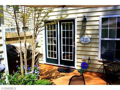 Exterior Back - French Doors lead to rear deck