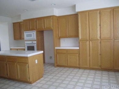 Large kitchen with eat-in nook area.