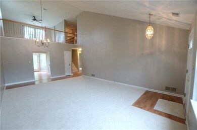 Great room with cathedral ceiling, with new carpet