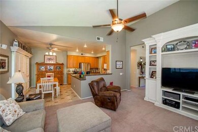 Family room looking toward kitchen and dining area
