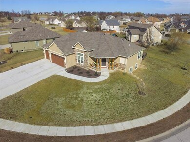 907 S Ash St, Raymore, MO 64083 - photo 2