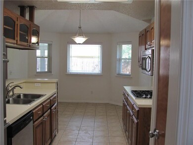 Kitchen - Galley kitchen stocked with new stainles