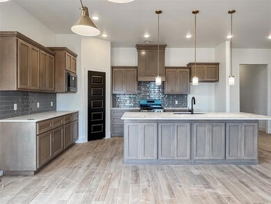 Kitchen featuring a sink, stainless steel applianc