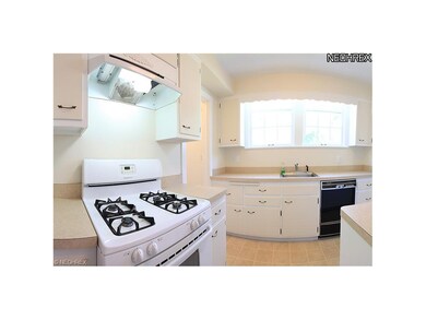 This light and bright kitchen includes laminate co