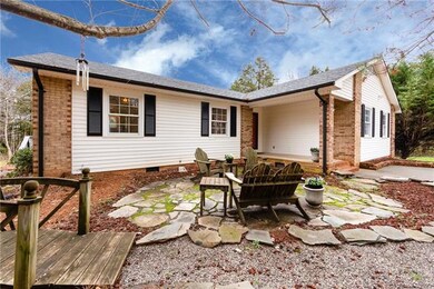 Flagstone patio and covered porch add to the curb appeal!