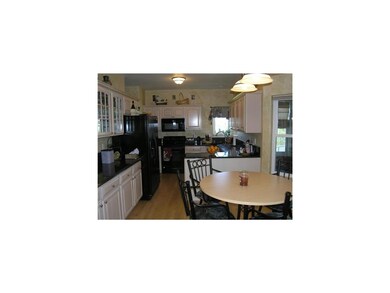 Kitchen. Kitchen with wood floors, new granite cou