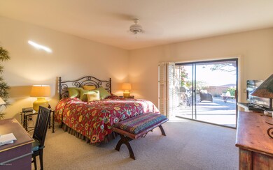 Large master bed-city views