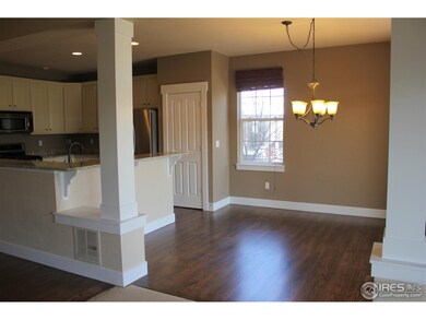 Dining area w new wood floor