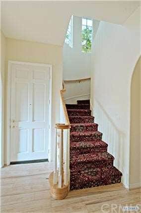 Foyer and stairway at entrance.
