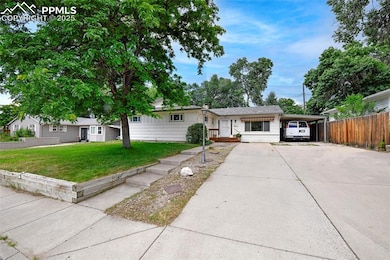 View Of Front Of Home, Driveway, & Carport