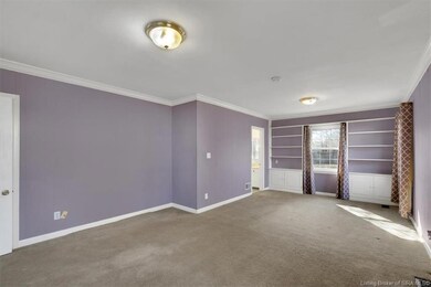 Master bedroom with built in shelves.