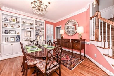 Formal Dining Room with crown molding, chair rail 