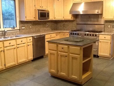 Brand new hardware, granite, and glass tile.