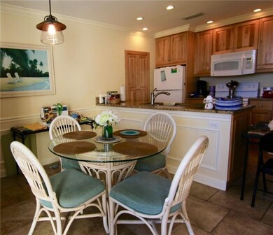 Dining Room with Island style granite counter tops