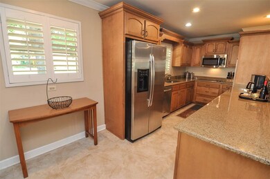 Between the kitchen and pantry there is a breakfas
