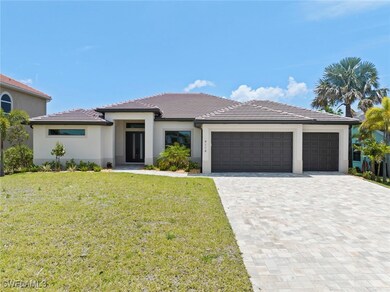 Prairie-style home with an attached garage, decora