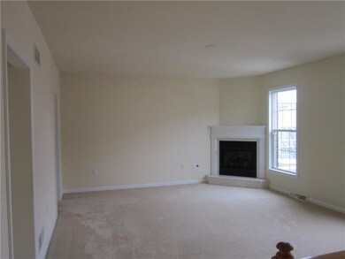 Living Room. Gas Corner Fireplace in Spacious Main
