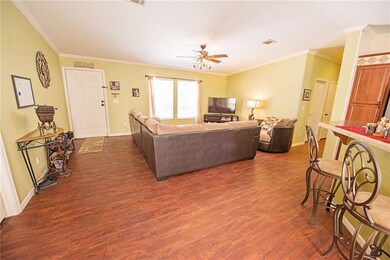 View of Living Area from Dining Area.