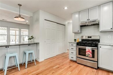 Kitchen island can seat up to 4, so much surface s