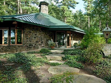 Entry. Built with stone, stucco,...