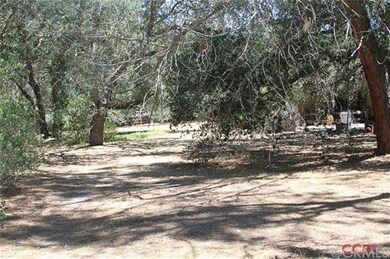 Beautifully wooded grounds provide shady comfort.