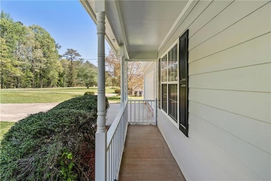 Balcony featuring a porch