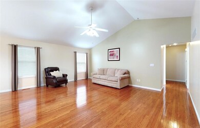 Spacious Great Room with Vault and Gleaming Hardwo