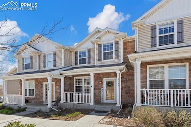 View of front of property featuring a porch and st