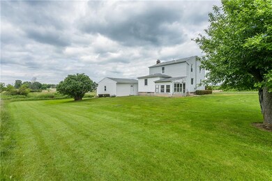 Rear exterior with view of the lost that is mowed