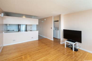Living toward entry and hall way to bedroom