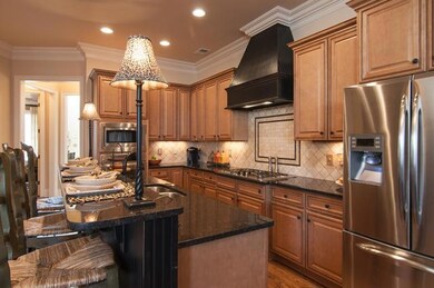 Kitchen with granite and lighting upgrades