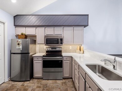 Stainless steel appliances, under cabinet lighting.