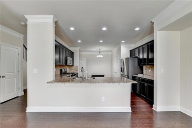 Kitchen with appliances with stainless steel finis