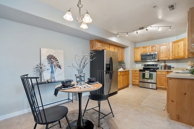 Kitchen/ dining area with linoleum flooring