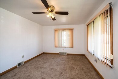 LIVING ROOM 14X11:  Light and bright shows off this freshly painted and brand new carpeting room.
