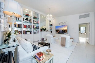 Living room featuring light tile patterned floorin