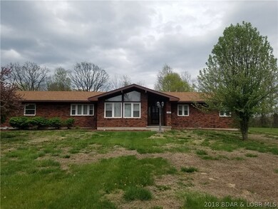 Large front yard as well on this lovely low mainte