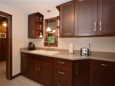 Kitchen. The kitchen was updated to maximize work 