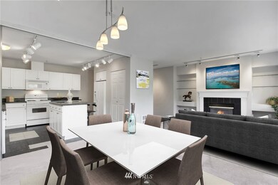 Open Floorplan showcasing Kitchen/Dining/Living room w/gas Fireplace