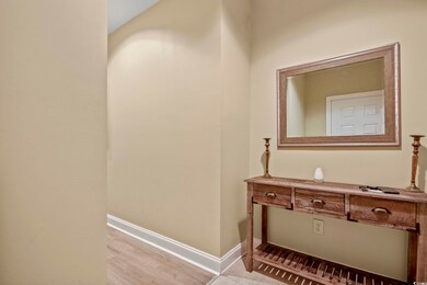 Bathroom with hardwood / wood-style floors