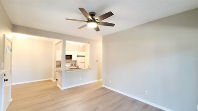 Kitchen open to dining and living room