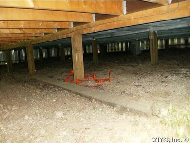 Other. View under home, has wire screening underne