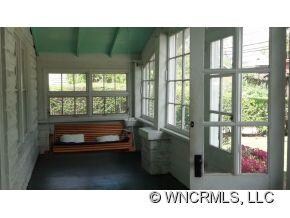 Glassed in front porch