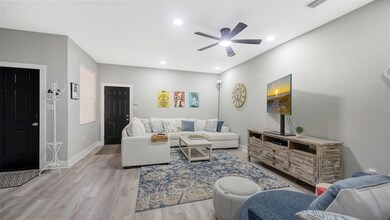 Looking into Great Room, note new flooring and ceiling fan.